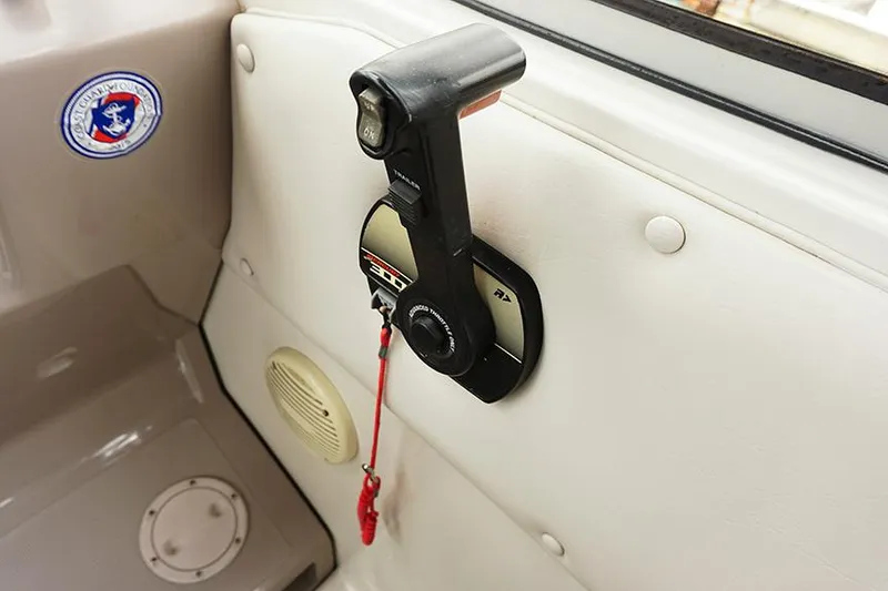 Slide: The Image of Throttle control on 2000 Regal Commodore 2660 boat interior. - 25
