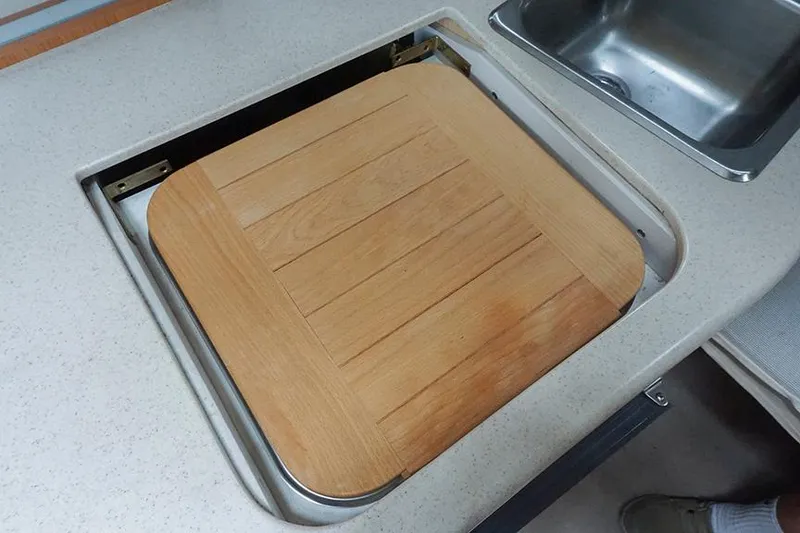 Slide: The Image of Wooden cutting board on Regal Commodore 2660 boat kitchen counter, 2000 model. - 36