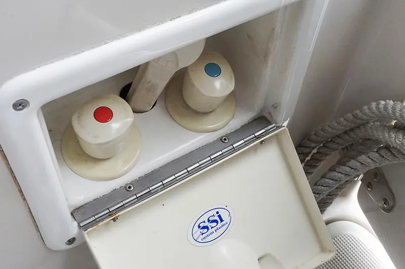 Slide: The Image of Boat water control knobs on a 2000 Regal Commodore 2660. - 48