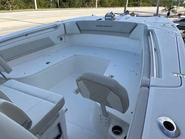 Slide: The Image of 2025 World Cat 295 CC boat interior with spacious seating and modern design. - 4