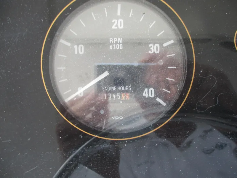 Slide: The Image of Tachometer of 1997 Ocean Yachts 40 Super Sport showing engine hours. - 15