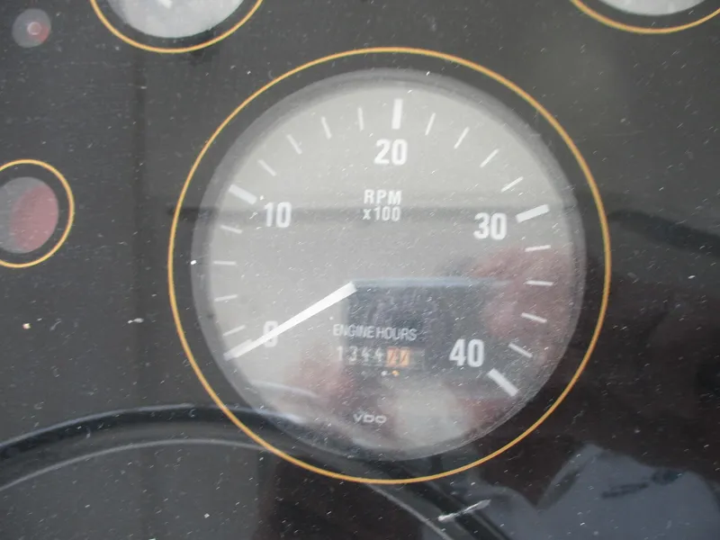 Slide: The Image of Close-up of a 1997 Ocean Yachts 40 Super Sport RPM gauge showing engine hours. - 16