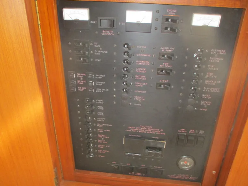 Slide: The Image of Electrical control panel on a 1997 Ocean Yachts 40 Super Sport boat. - 32