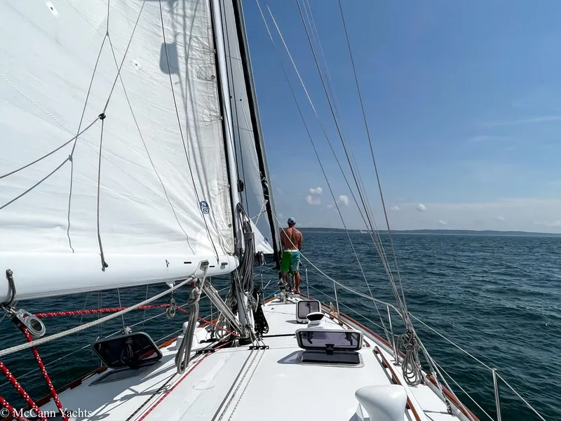 Slide: The Image of Sailing on a 1973 Challenger 40 yacht in open sea under clear blue skies. - 7