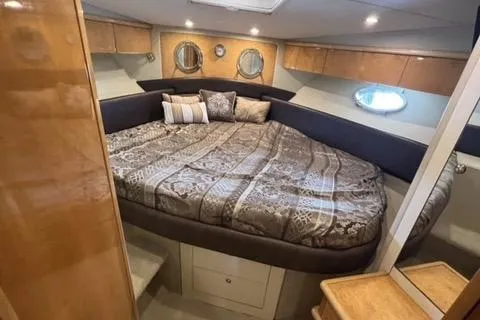 Slide: The Image of Luxurious cabin interior of 1994 Sunseeker Camargue 55 yacht with cozy bedding. - 12