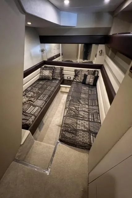 Slide: The Image of Interior cabin of 1994 Sunseeker Camargue 55 yacht with twin beds and modern decor. - 17