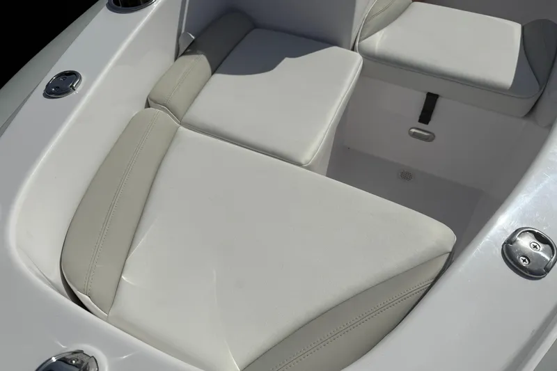 Slide: The Image of Luxurious seating on 2025 Airship 115 boat, featuring sleek white and beige cushions. - 7