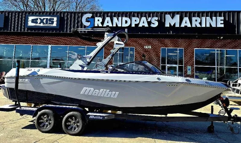 The Image of 2025 Malibu Wakesetter 23 LSV boat displayed at Grandpa's Marine dealership. - 1
