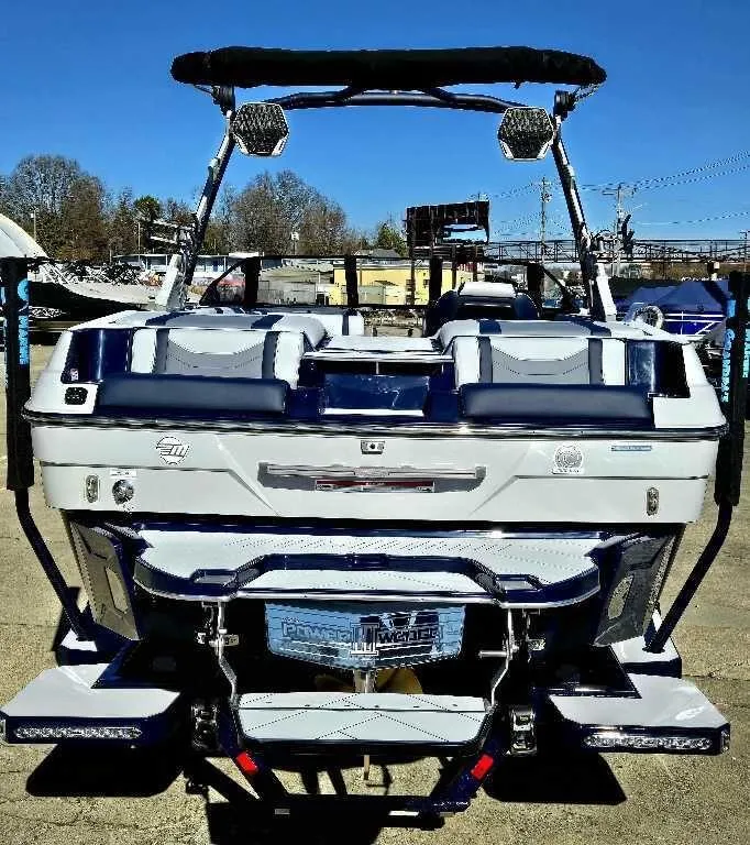 Slide: The Image of 2025 Malibu Wakesetter 23 LSV boat, rear view, showcasing sleek design and modern features. - 4