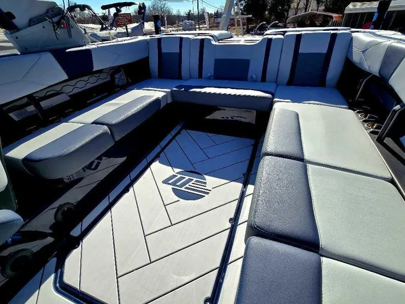 Slide: The Image of 2025 Malibu Wakesetter 23 LSV interior with spacious seating and stylish design. - 7