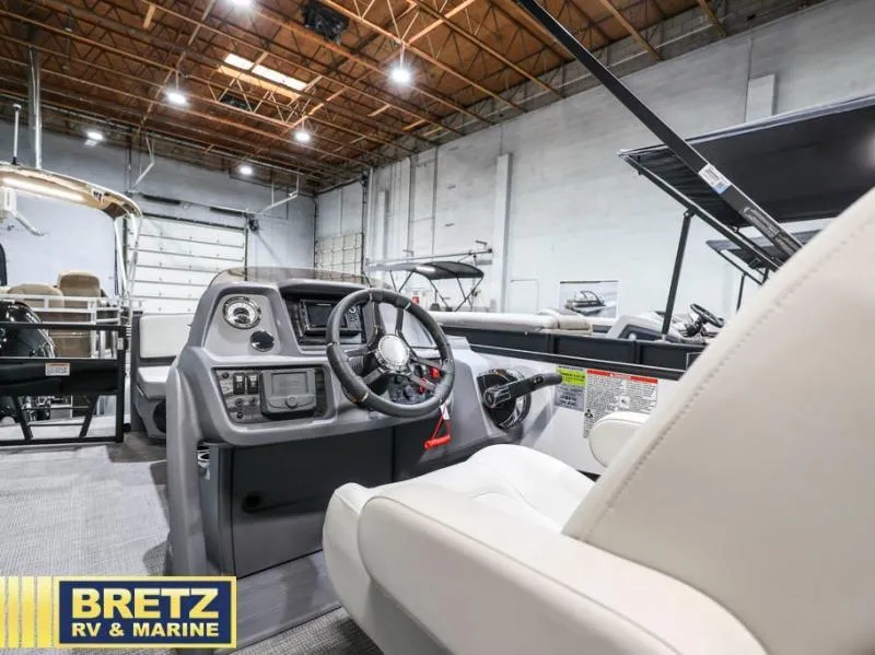 Slide: The Image of 2025 Mirage LZ A-22 SPORT boat interior at Bretz RV & Marine showroom. - 11