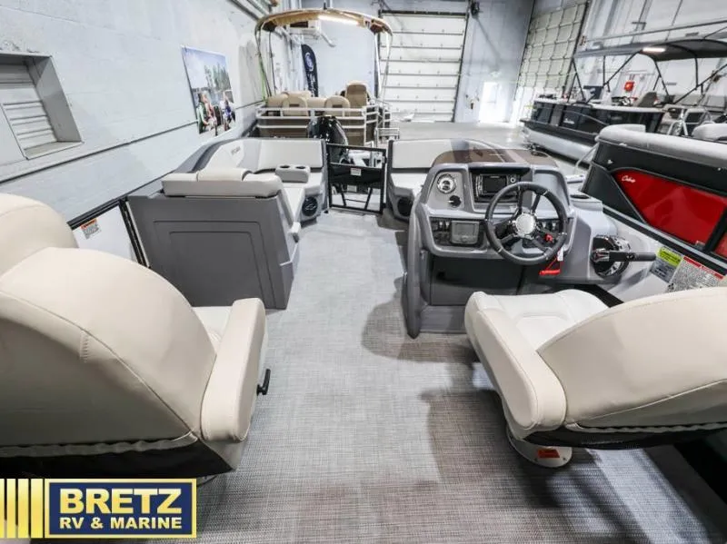 Slide: The Image of 2025 Mirage LZ A-22 SPORT boat interior with modern seating and control panel. - 12