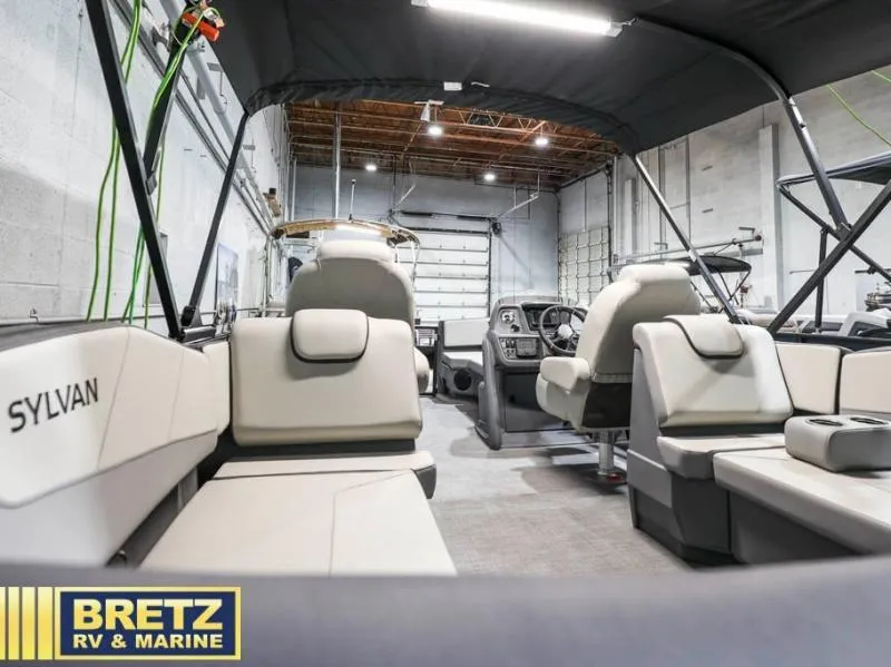 Slide: The Image of Interior of a 2025 Mirage LZ A-22 SPORT boat at Bretz RV & Marine showroom. - 13