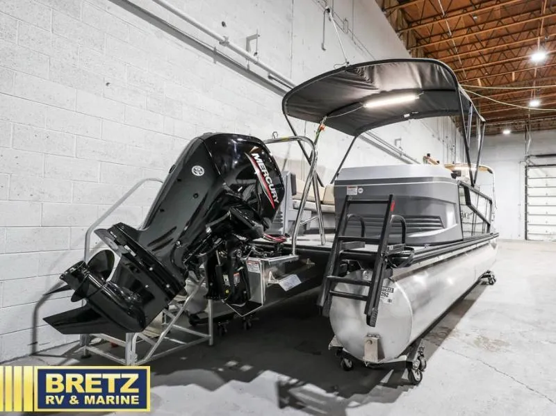 Slide: The Image of 2025 Mirage LZ A-22 SPORT pontoon boat with Mercury engine in showroom. - 7