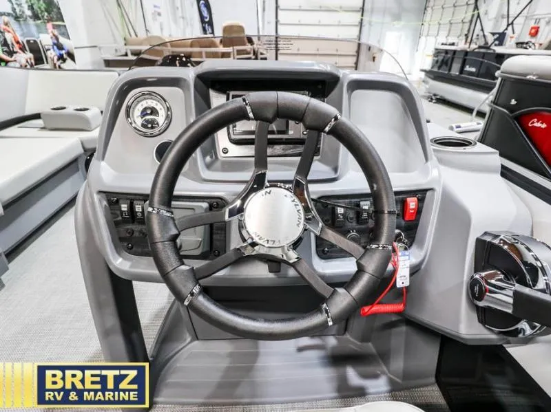 Slide: The Image of Steering console of 2025 Mirage LZ A-22 SPORT boat at Bretz RV & Marine showroom. - 9