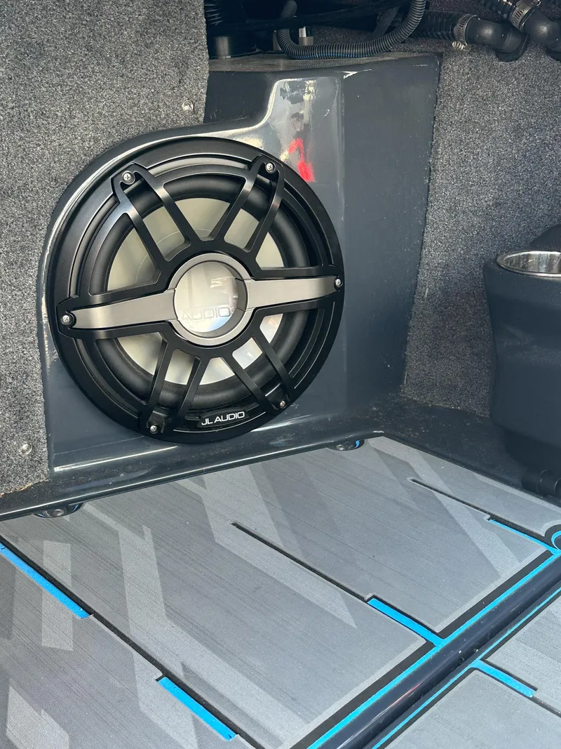 Slide: The Image of 2022 Supra SE interior with premium audio system and sleek design. - 17