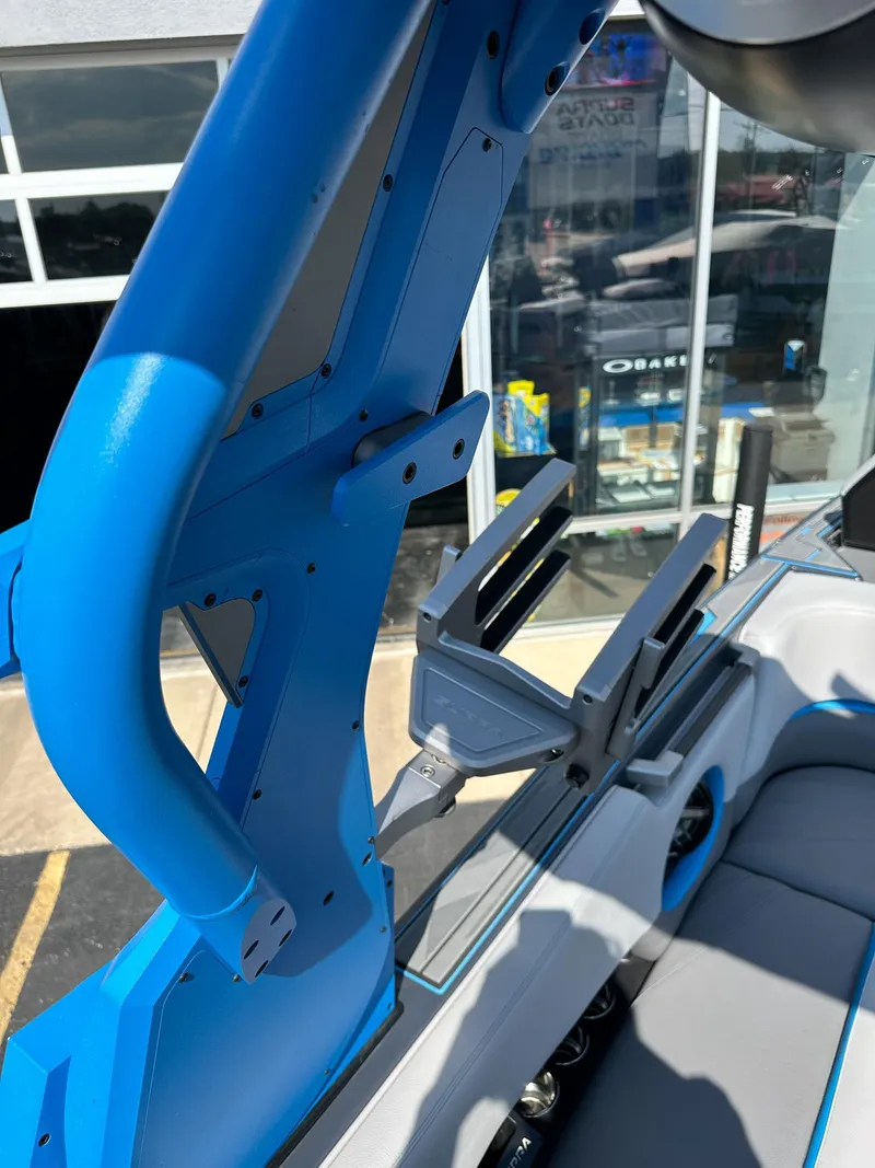 Slide: The Image of 2022 Supra SE boat interior with blue accents and modern design elements. - 25