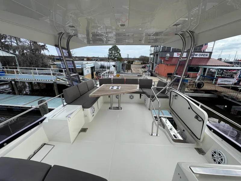 Slide: The Image of Interior view of a 2016 Prestige 550 yacht at the dock. - 12