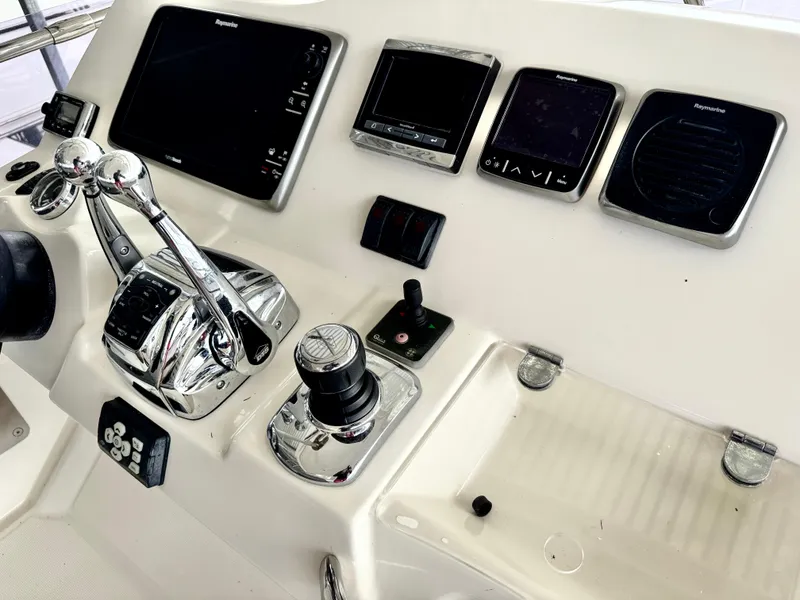 Slide: The Image of Control console of a 2016 Prestige 550 yacht with modern navigation equipment. - 17