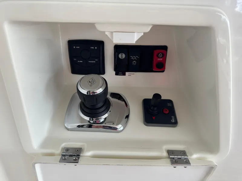 Slide: The Image of Control panel of a 2016 Prestige 550 yacht. - 19