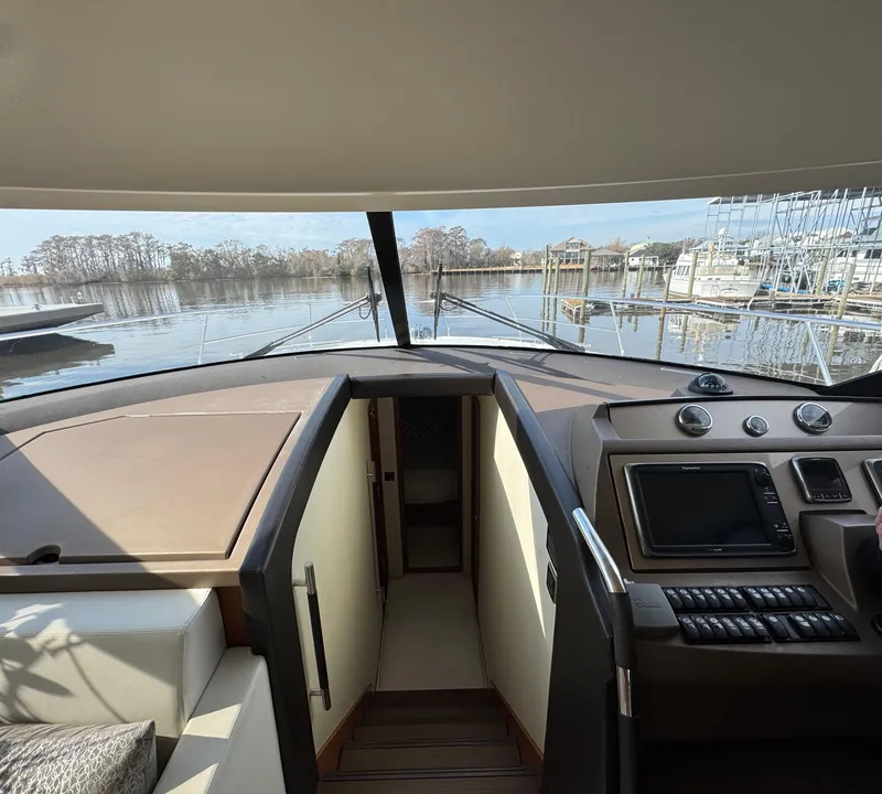 Slide: The Image of Interior view of a 2016 Prestige 550 yacht in harbor. - 23