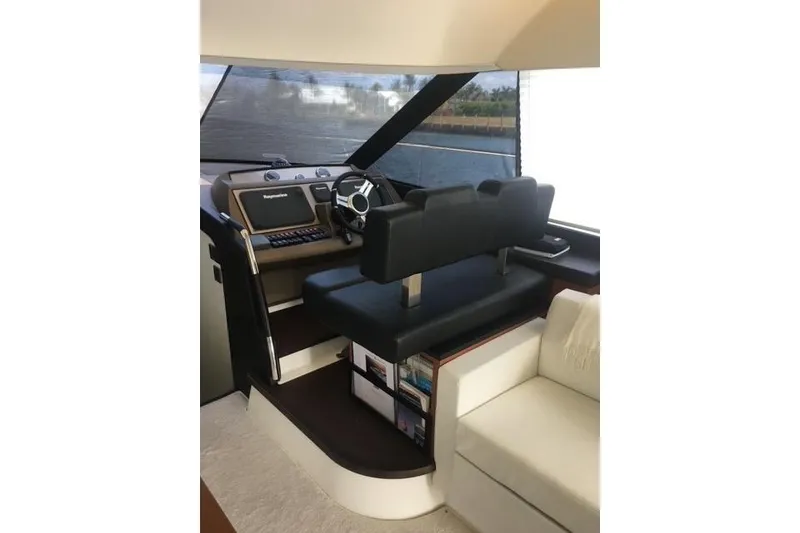 Slide: The Image of Interior helm of 2016 Prestige 550 yacht with modern navigation equipment. - 24