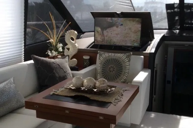 Slide: The Image of Luxurious interior of a 2016 Prestige 550 yacht with elegant decor and modern amenities. - 27