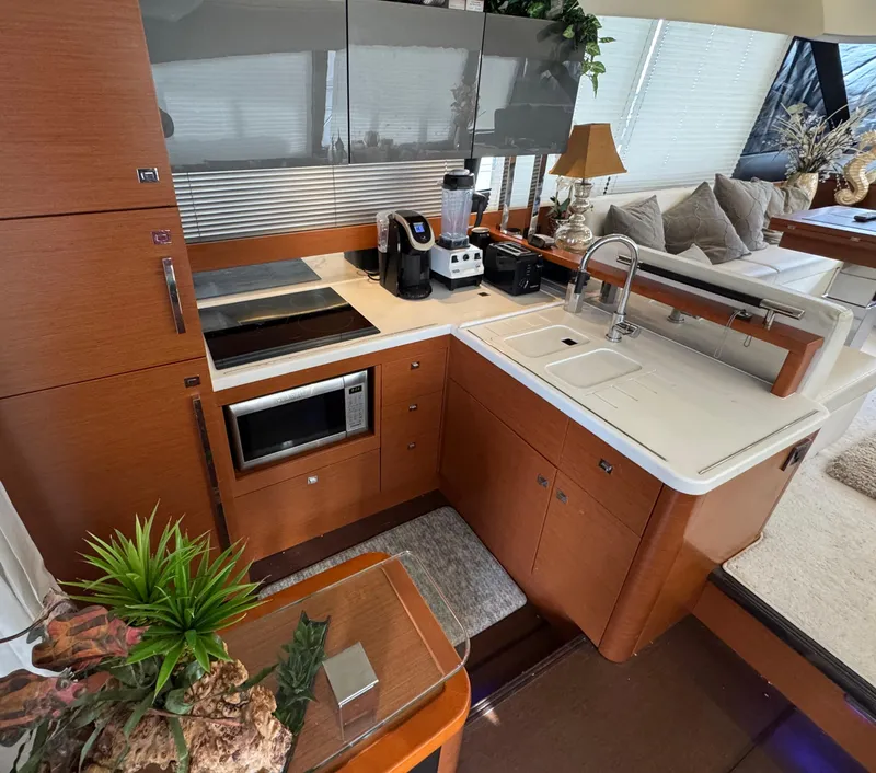 Slide: The Image of Modern kitchen on a 2016 Prestige 550 yacht. - 28