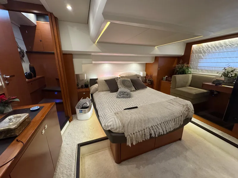 Slide: The Image of Luxurious bedroom on a 2016 Prestige 550 yacht. - 32