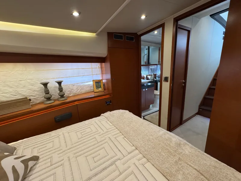 Slide: The Image of Luxurious bedroom on a 2016 Prestige 550 yacht. - 34