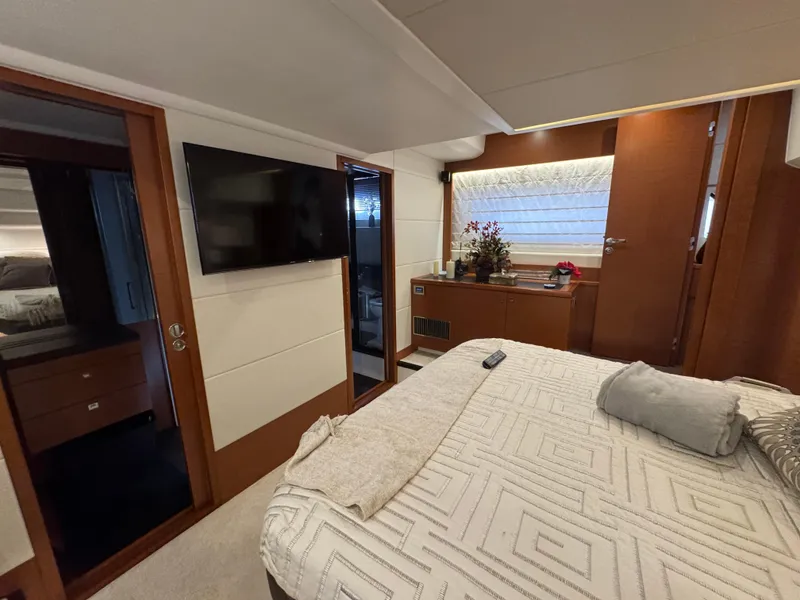 Slide: The Image of Luxurious bedroom on a 2016 Prestige 550 yacht. - 36