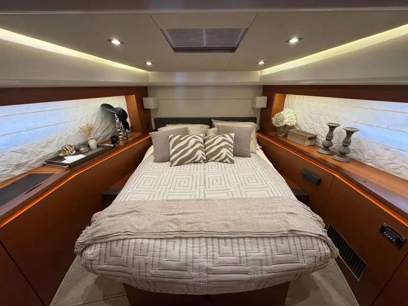 Slide: The Image of Luxurious bedroom on a 2016 Prestige 550 yacht. - 43