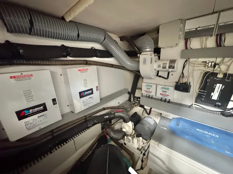 Slide: The Image of Engine room of a 2016 Prestige 550 yacht with electrical systems. - 46