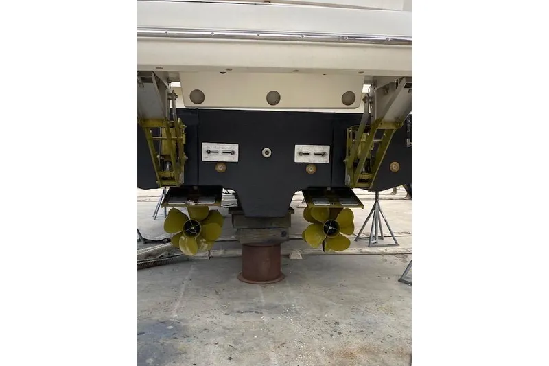 Slide: The Image of Rear view of a 2016 Prestige 550 yacht showing dual propellers and hull details. - 58