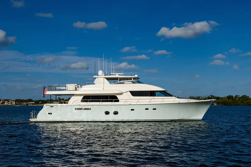 The Image of 2009 Pacific Mariner 85 yacht cruising on a sunny day with blue skies. - 0