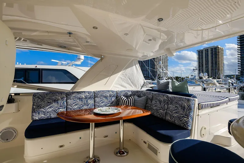 Slide: The Image of Luxurious 2009 Pacific Mariner 85 yacht interior with elegant seating and table. - 16