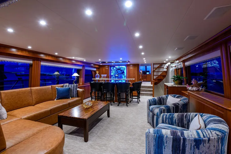 Slide: The Image of Luxurious interior of a 2009 Pacific Mariner 85 yacht with elegant seating and ambient lighting. - 22
