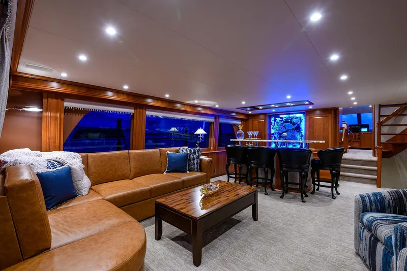 Slide: The Image of Luxurious interior of 2009 Pacific Mariner 85 yacht with elegant seating and ambient lighting. - 23