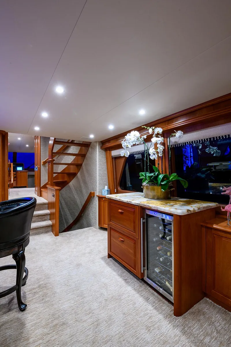 Slide: The Image of Luxurious interior of a 2009 Pacific Mariner 85 yacht with elegant wood finishes and modern amenities. - 27