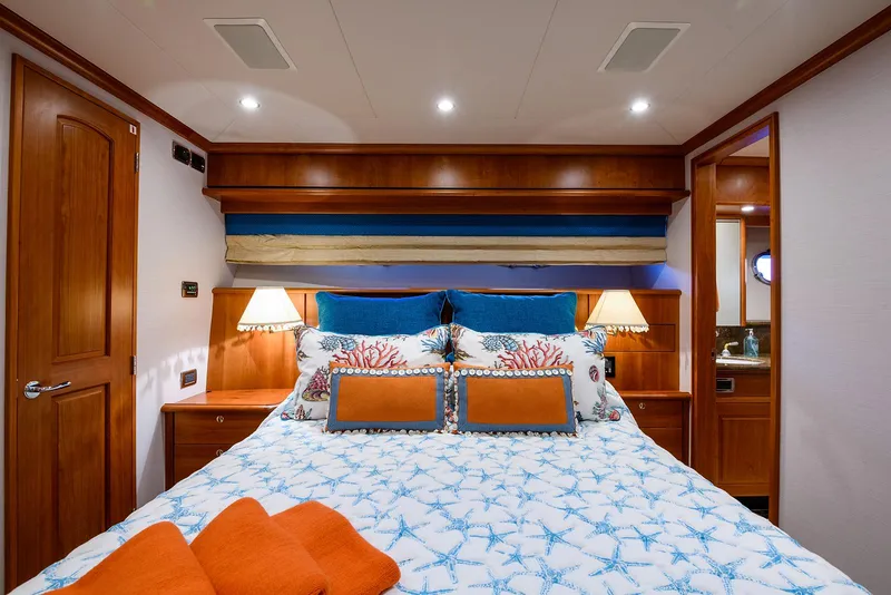 Slide: The Image of Luxurious bedroom interior of 2009 Pacific Mariner 85 yacht with elegant bedding and warm lighting. - 39