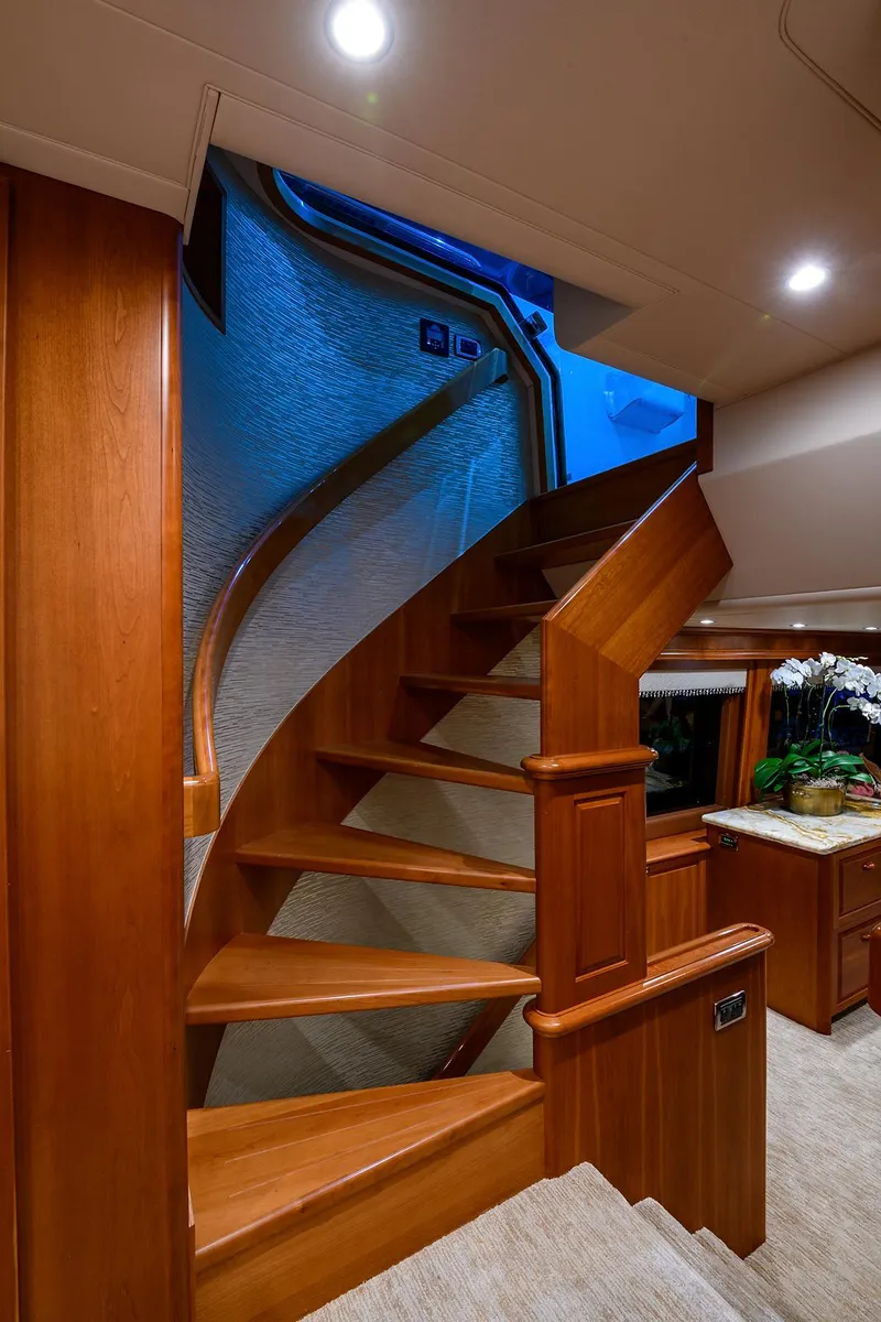 Slide: The Image of Elegant wooden staircase on a 2009 Pacific Mariner 85 yacht interior. - 41