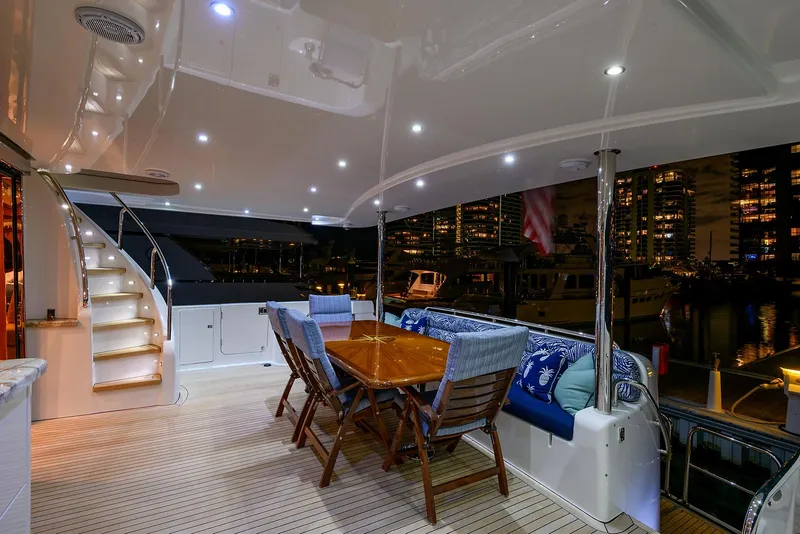 Slide: The Image of Luxurious 2009 Pacific Mariner 85 yacht deck with elegant seating and ambient lighting. - 5