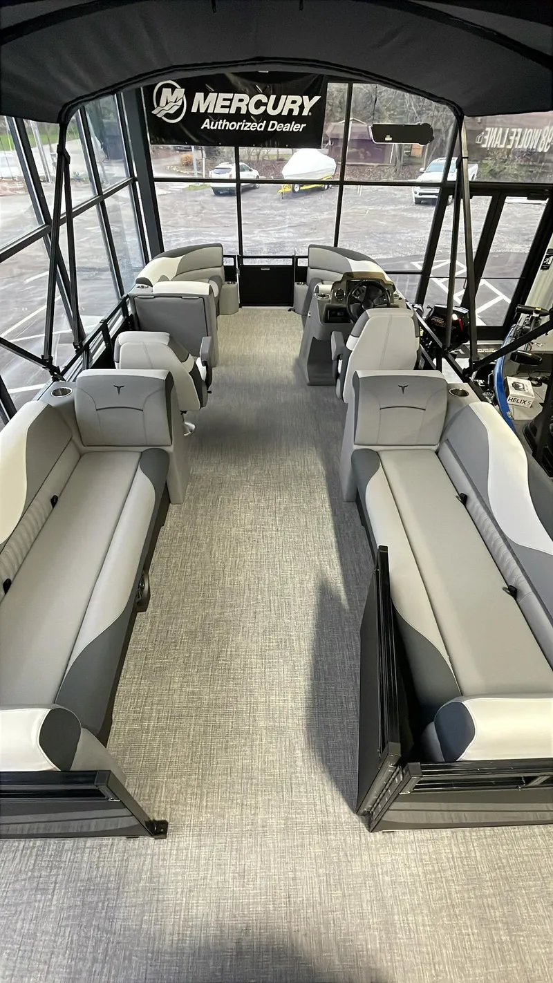 Slide: The Image of 2025 Tahoe Pontoon SP 2385 QL interior with spacious seating and modern design. - 11