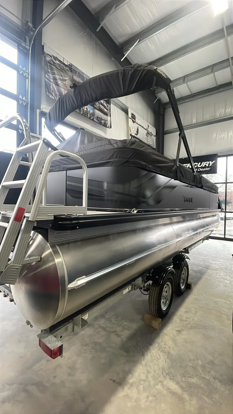 Slide: The Image of 2025 Tahoe Pontoon SP 2385 QL in showroom, side view with canopy. - 4