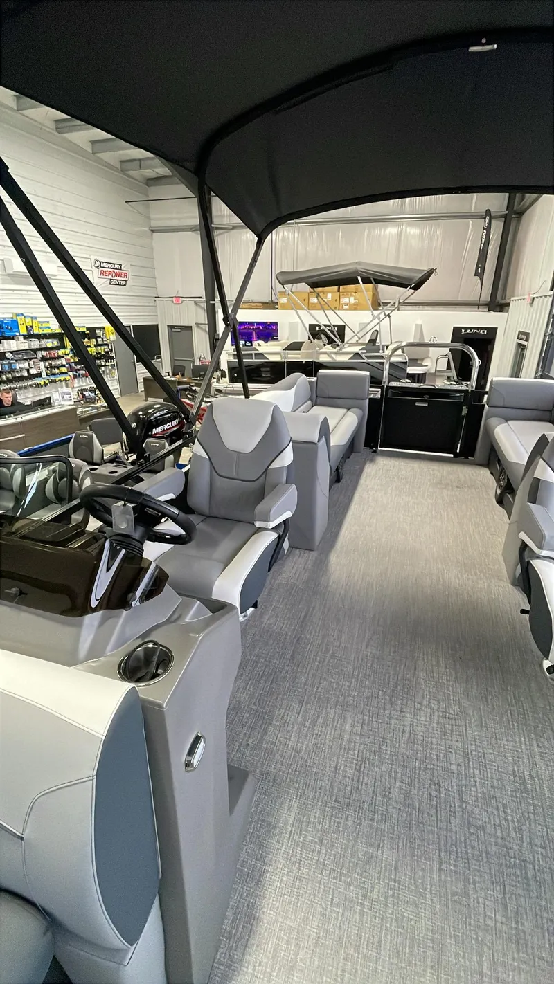 Slide: The Image of 2025 Tahoe Pontoon SP 2385 QL interior with modern seating and sleek design. - 8