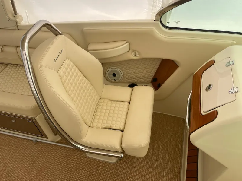 Slide: The Image of 2020 Chris-Craft Launch 28GT interior with beige seating and elegant design. - 20