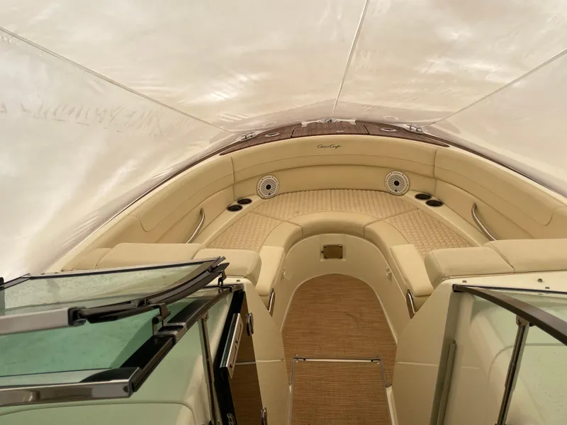 Slide: The Image of 2020 Chris-Craft Launch 28GT interior with beige seating and elegant design. - 26