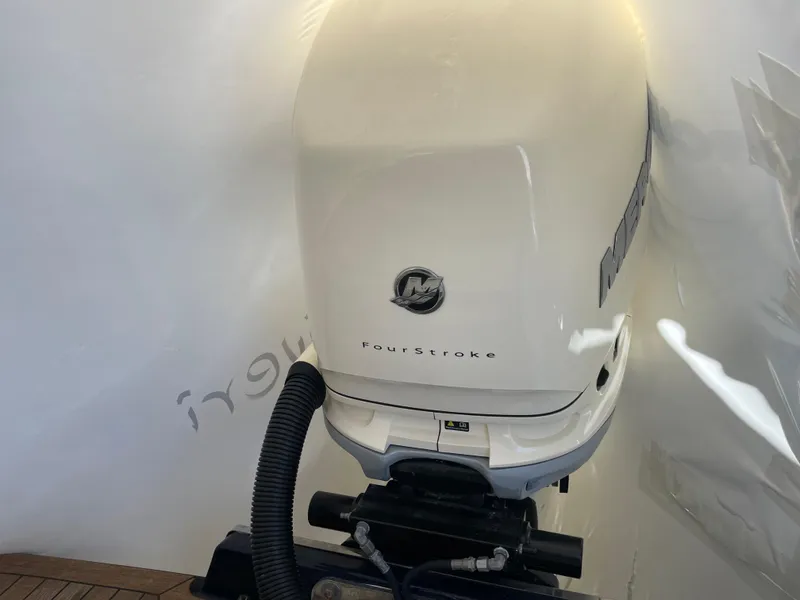 Slide: The Image of 2020 Chris-Craft Launch 28GT boat engine, featuring a Mercury FourStroke outboard motor. - 3