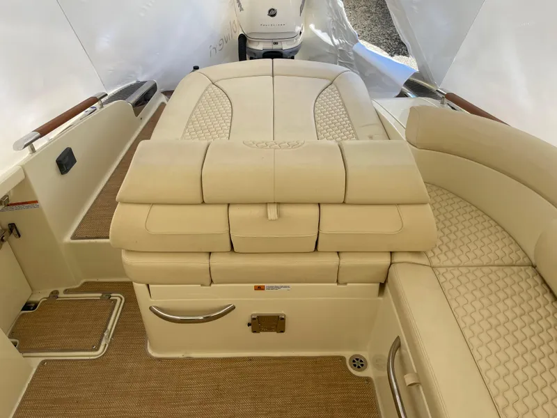 Slide: The Image of 2020 Chris-Craft Launch 28GT interior with beige leather seating and elegant design. - 7