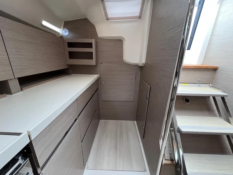 Slide: The Image of Modern interior of 2021 Hanse 418 yacht with sleek cabinetry and compact design. - 17